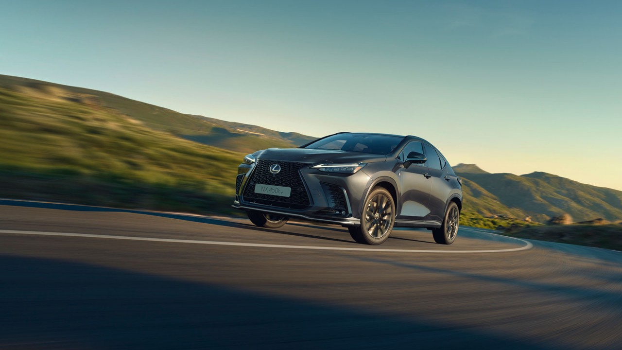 Lexus NX driving on a road